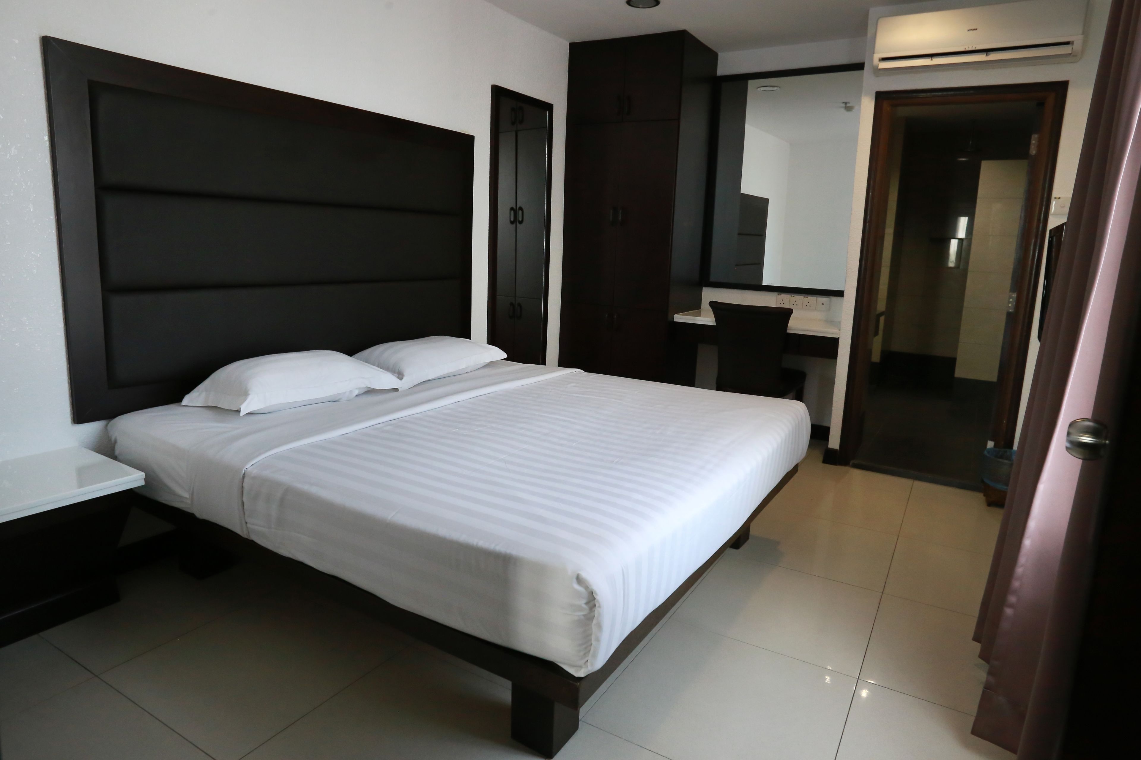 Premium bedding, pillow-top beds, in-room safe, desk