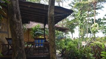 Bungalow, 1 grand lit, vue mer | Terrasse/Patio