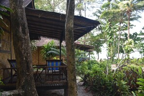 Basic Bungalow, 1 Queen Bed, Sea View | Terrace/patio