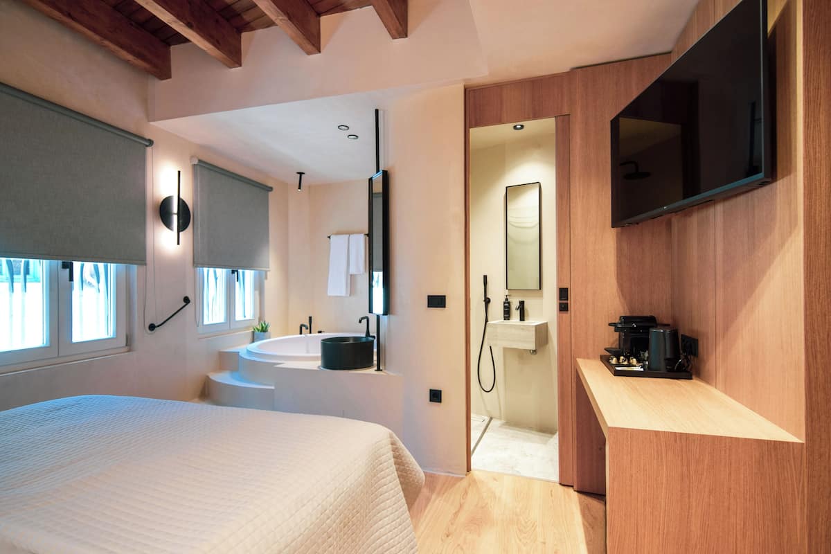 Premium bedding, pillow-top beds, in-room safe, blackout curtains