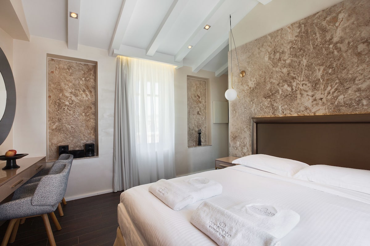 junior suite with private terrace and panoramic view | premium bedding, pillow-top beds, in-room safe, individually decorated