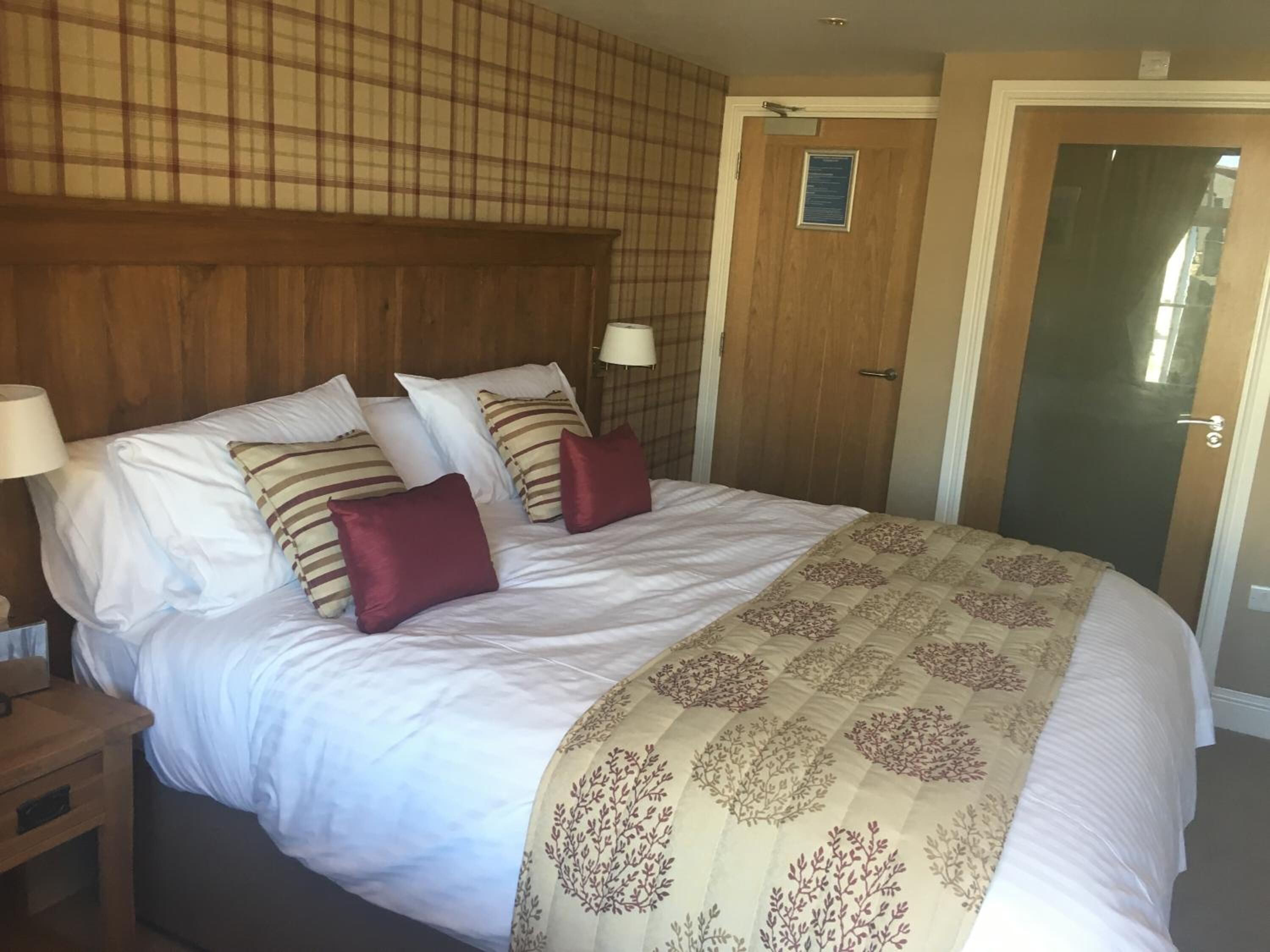 Premium bedding, in-room safe, individually decorated, blackout curtains