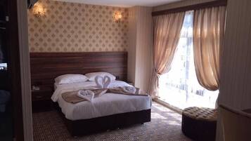 Minibar, desk, iron/ironing board, free cots/infant beds