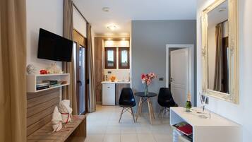 Studio Confort | Coin séjour | Télévision à écran plat