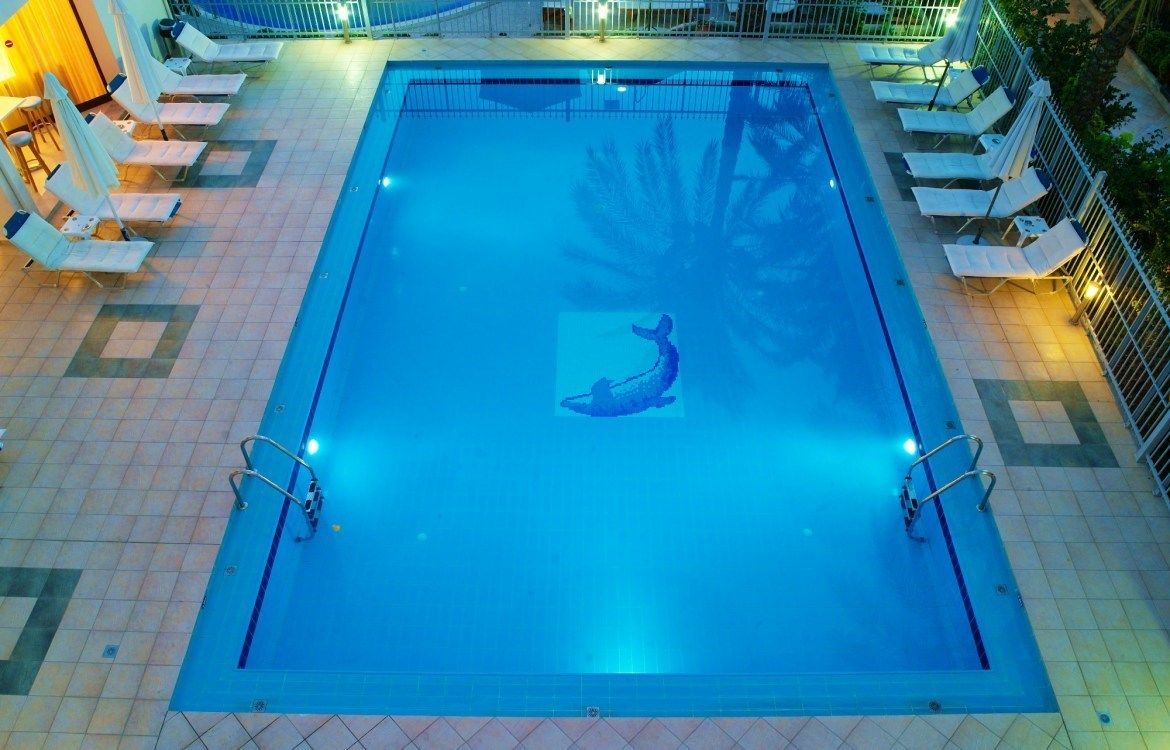 Outdoor pool, open 9:00 AM to 8:00 PM, pool umbrellas, sun loungers