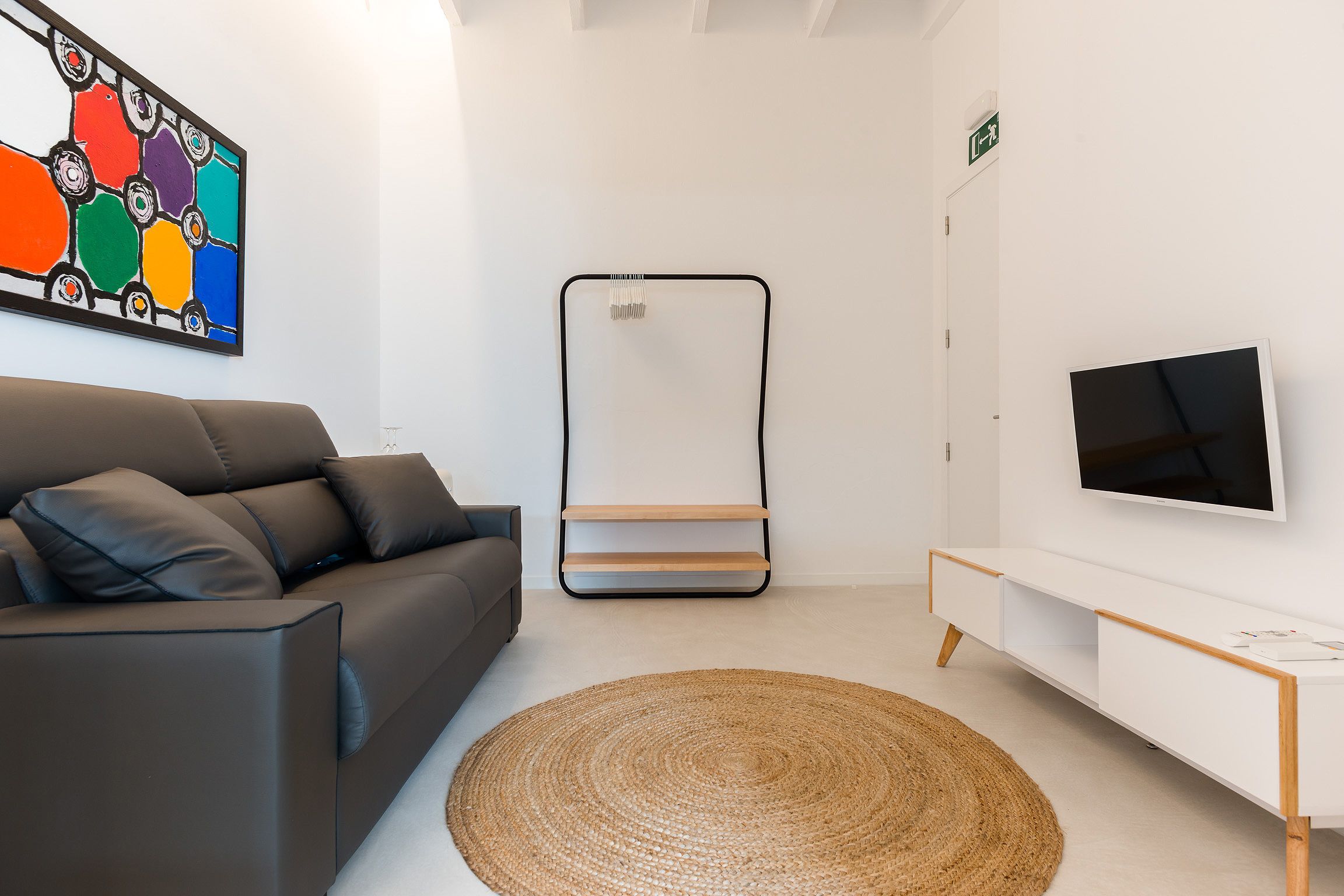 suite | living area | flat-screen tv