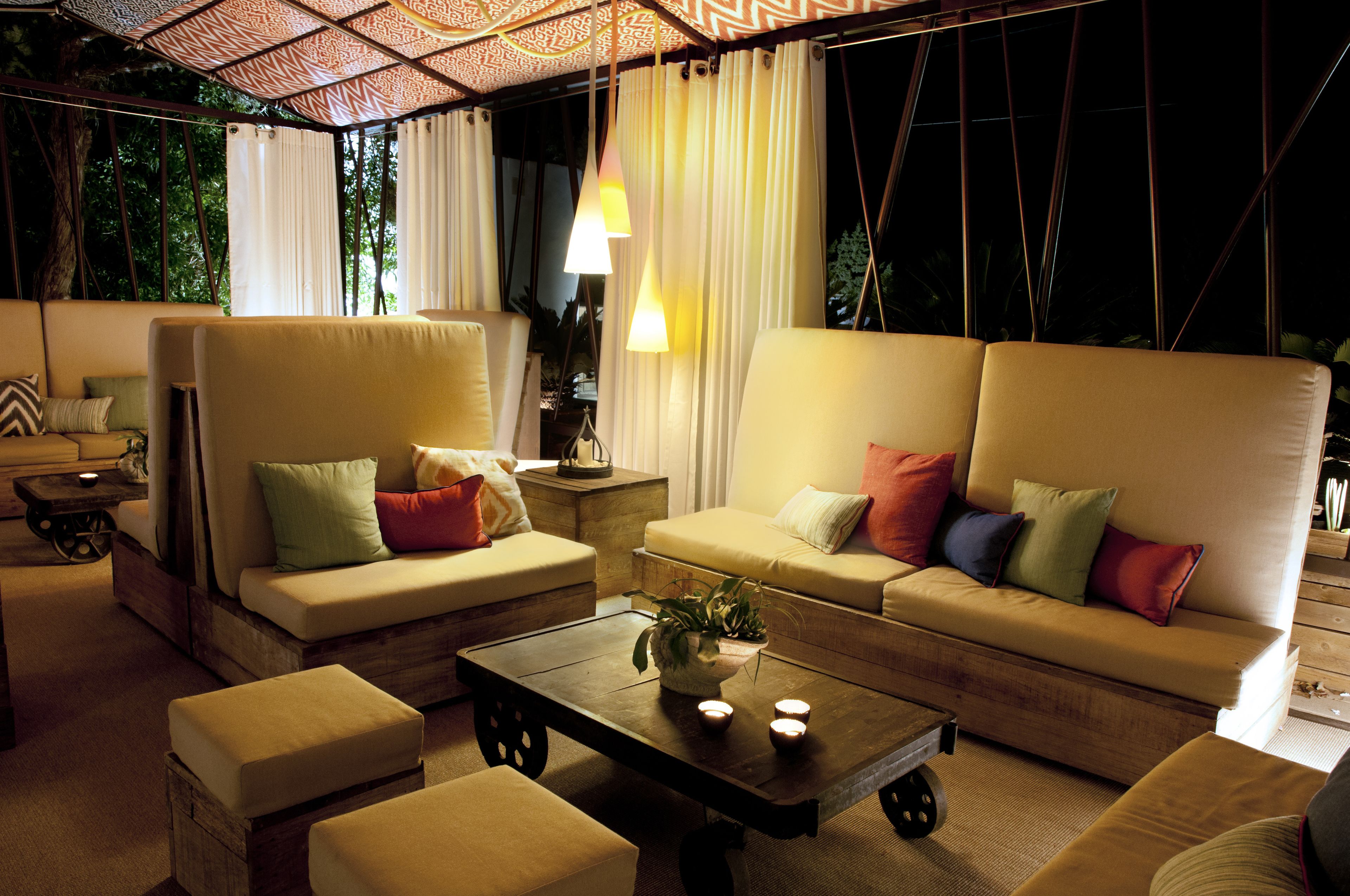 A cozy lounge area with two sofas, a coffee table, and a small side table.
