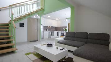 Duplex Two-Bedroom Apartment with Terrace | Living area | Flat-screen TV, heated floors