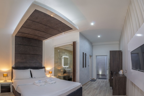Special Offer - Double Room with Round Airport Transfer | Premium bedding, desk, blackout drapes, iron/ironing board