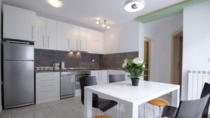 Duplex Two-Bedroom Apartment with Terrace | 전용 주방