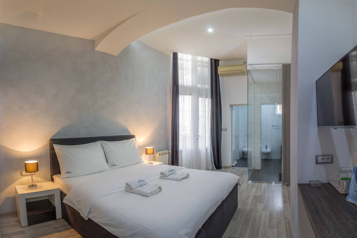 Premium bedding, desk, blackout curtains, iron/ironing board