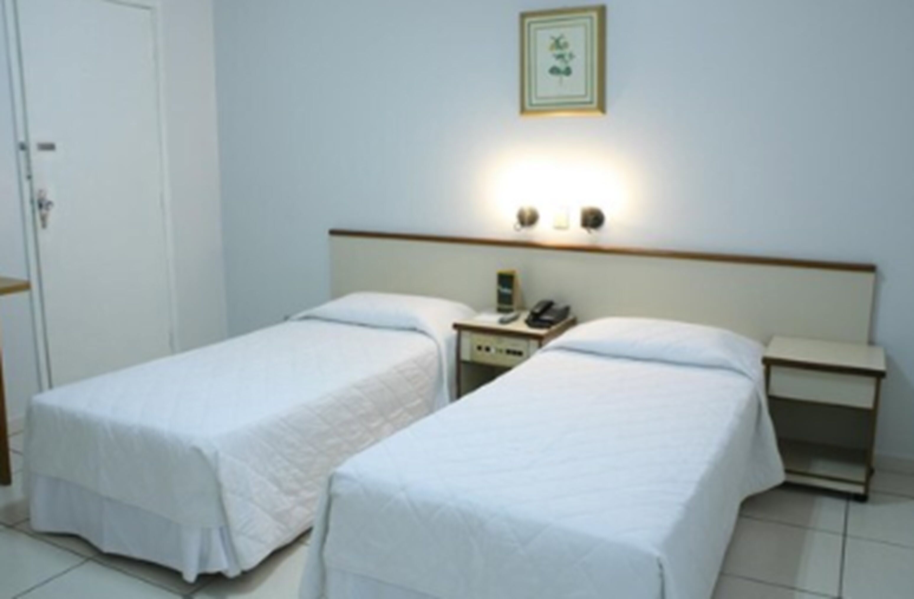 Standard Triple Room | Minibar, blackout curtains, free WiFi, bed sheets