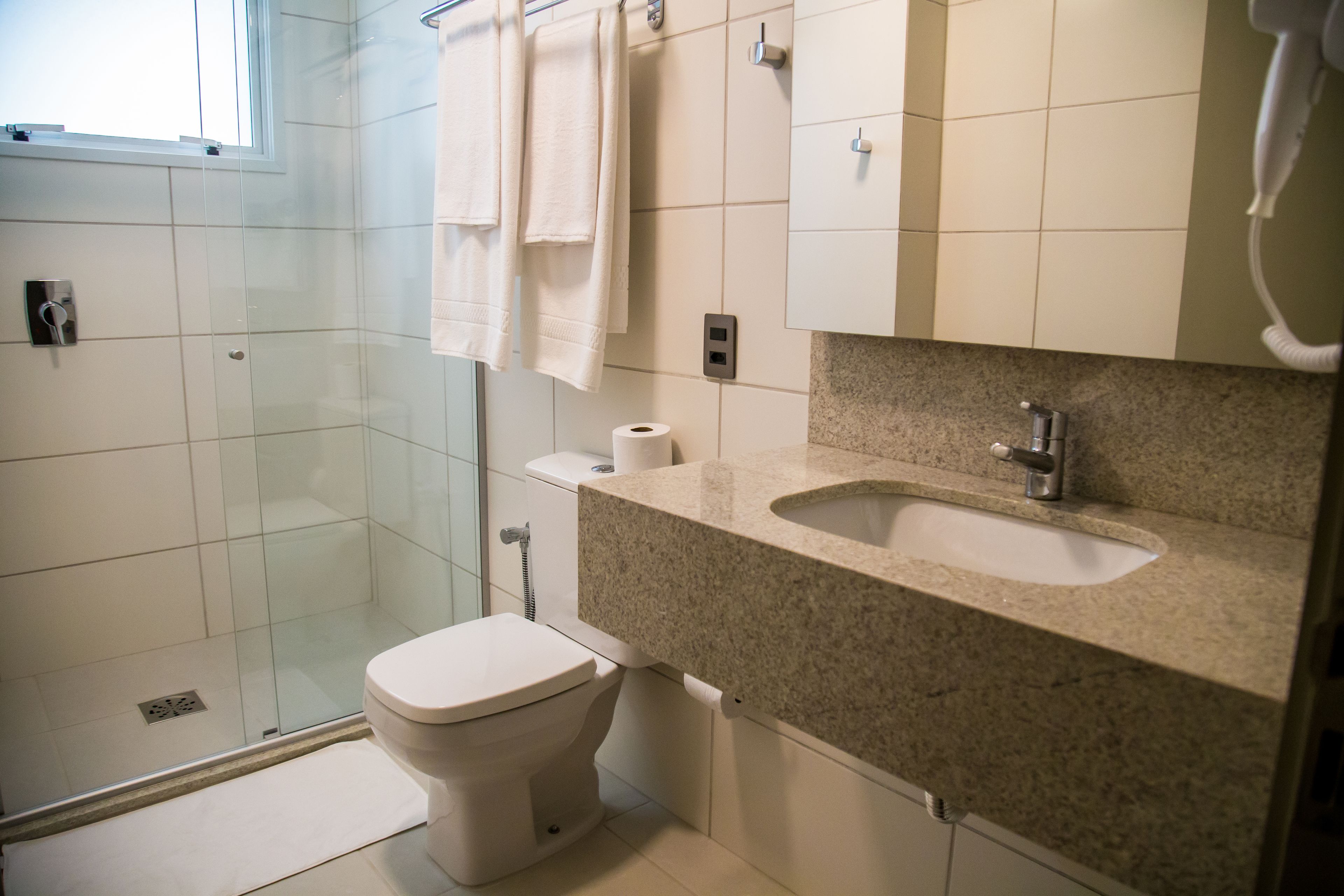 shower, rainfall showerhead, designer toiletries, hair dryer