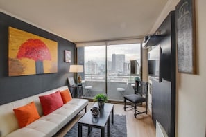 Standard Apartment, 2 Bedrooms | Living area | Flat-screen TV - Altos Alameda apartments (Santiago)