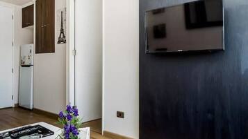 Standard Apartment, 1 Bedroom | Living area | Flat-screen TV