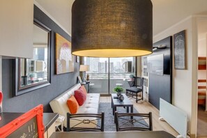 Standard Apartment, 2 Bedrooms | Living area | Flat-screen TV - Altos Alameda apartments (Santiago)