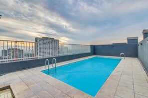 Seasonal outdoor pool - Altos Alameda apartments (Santiago)