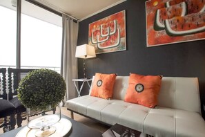 Standard Apartment, 2 Bedrooms | Living area | Flat-screen TV - Altos Alameda apartments (Santiago)