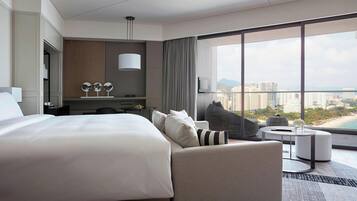 Premium bedding, down comforters, minibar, in-room safe