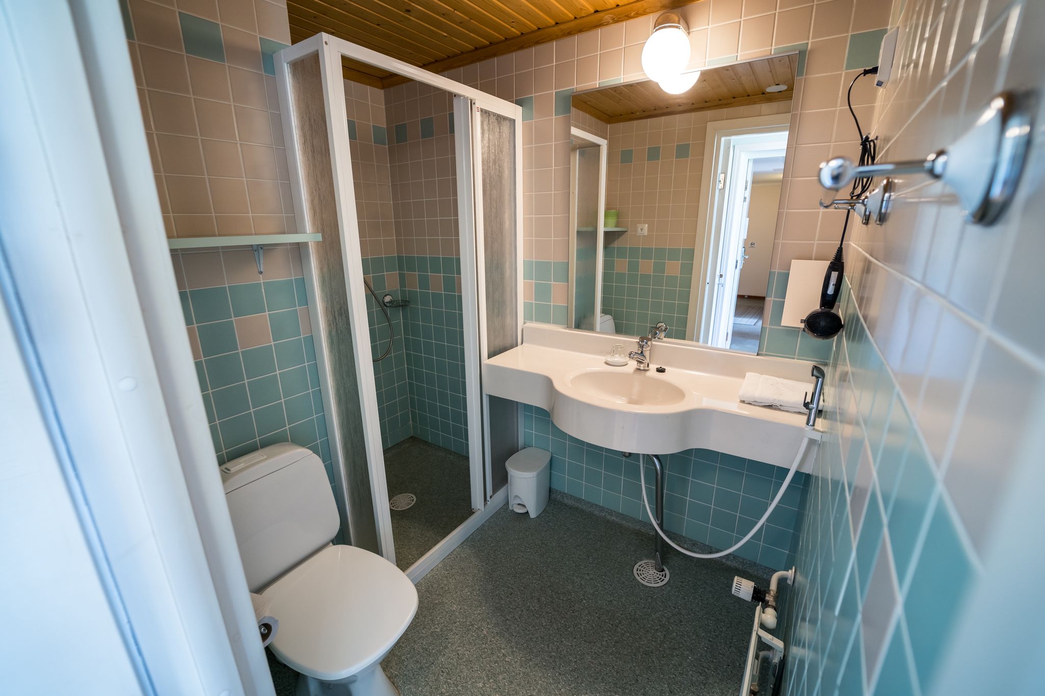 economy single room (annex - white house) | bathroom | hair dryer, towels, soap, shampoo