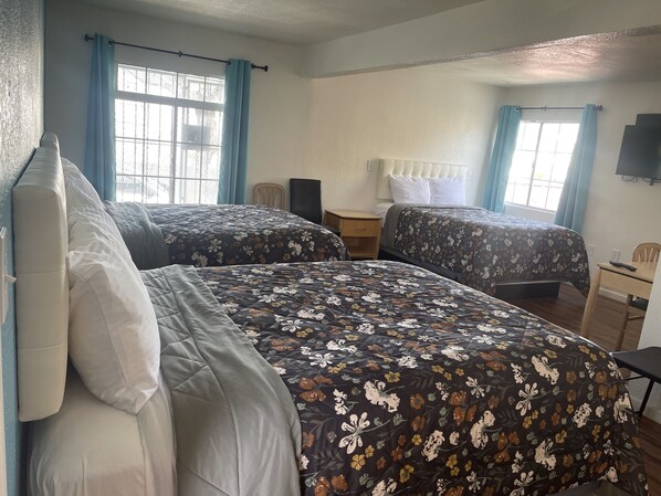 Habitación doble, varias camas | Wifi gratis 