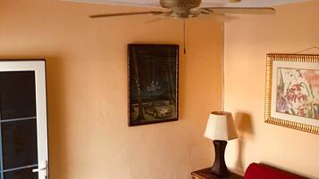 Comfort Suite, 1 Bedroom | Living area | Flat-screen TV