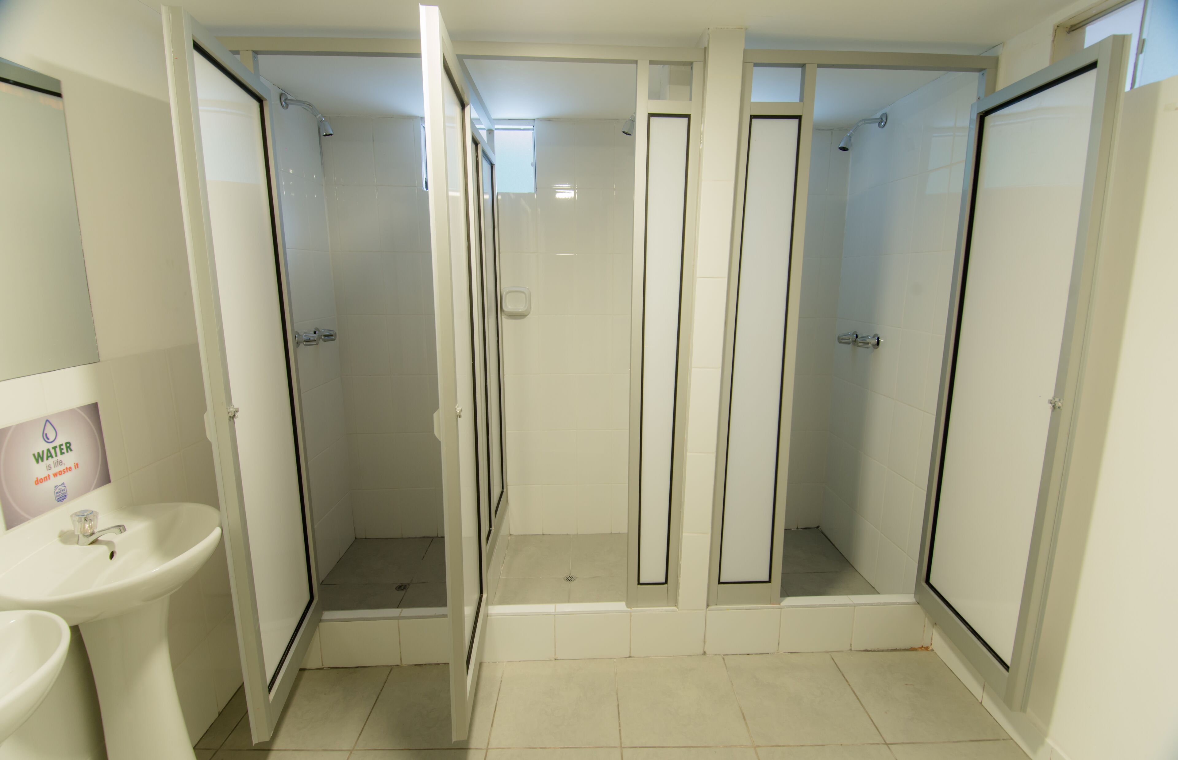 Shower, rainfall showerhead, towels