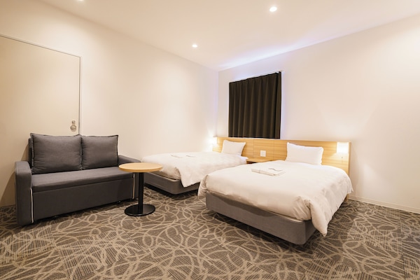 Deluxe Twin Room, Non Smoking (Sleeps up to 3 guests with sofa bed) | Premium bedding, down comforters, in-room safe, desk