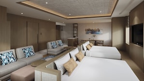 A modern hotel room with a sofa, a bed, a desk, and a TV. - Quintessa Hotel Osaka Bay (Osaka)