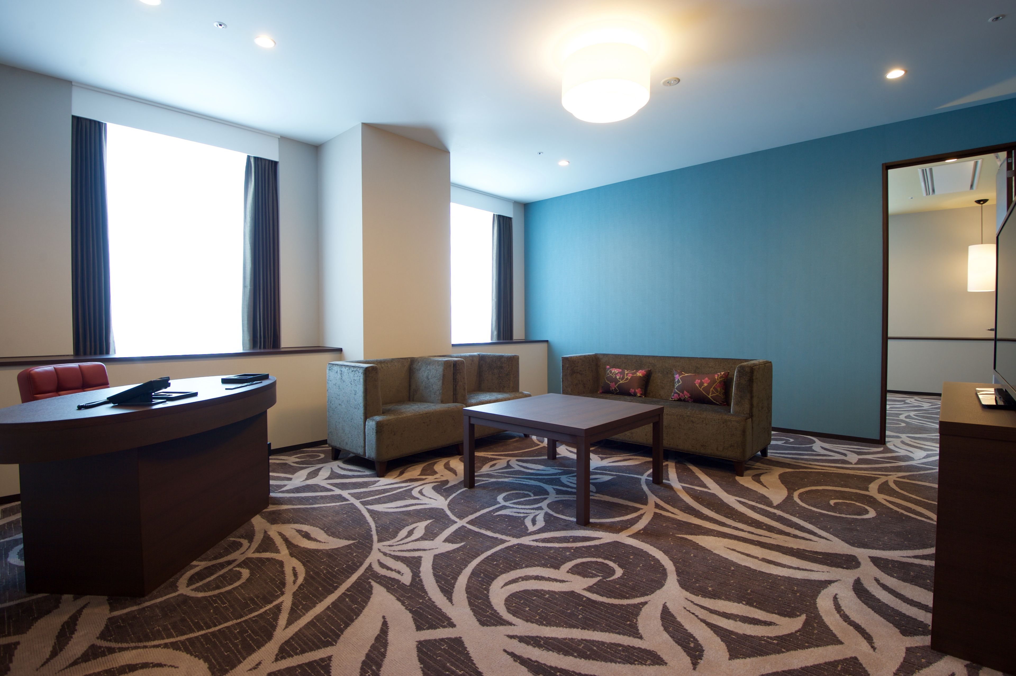 corner suite double room, non smoking | living area | flat-screen tv, pay films