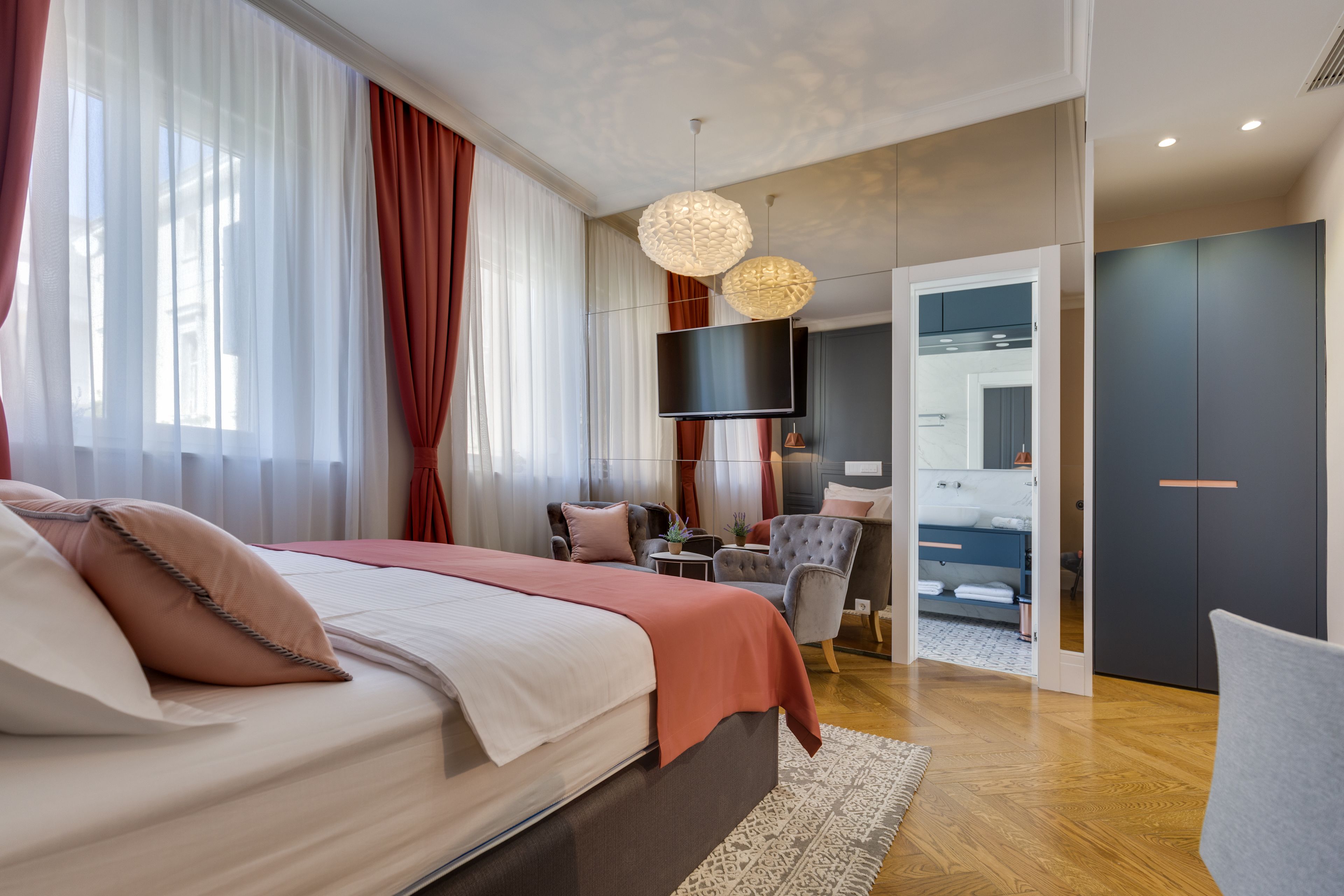 Premium bedding, free minibar items, desk, laptop workspace