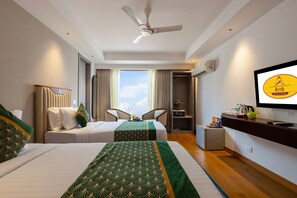 Executive Room | Premium bedding, minibar, in-room safe, individually furnished