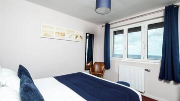 Premium bedding, desk, blackout drapes, soundproofing