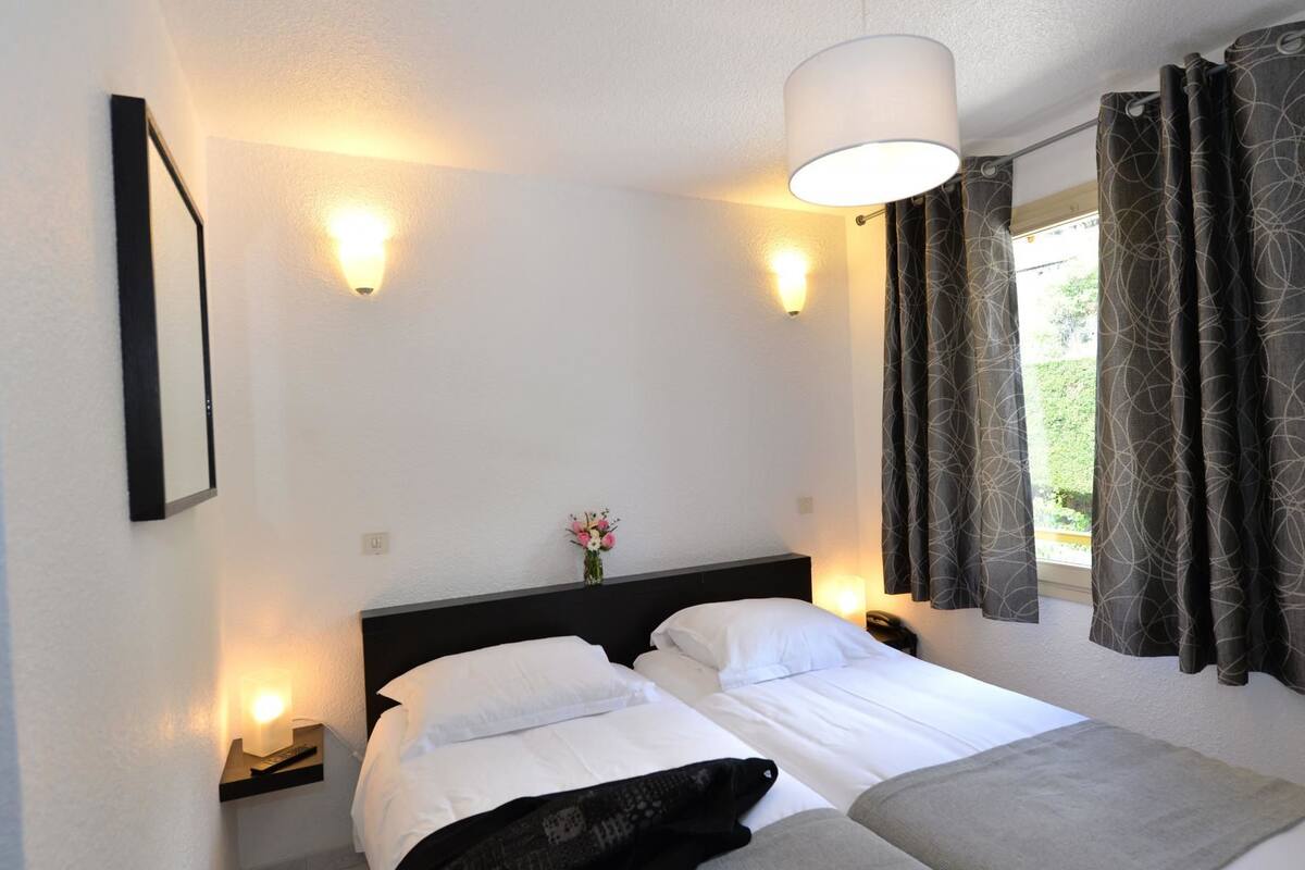 Standard Twin Room | Select Comfort beds, in-room safe, individually decorated
