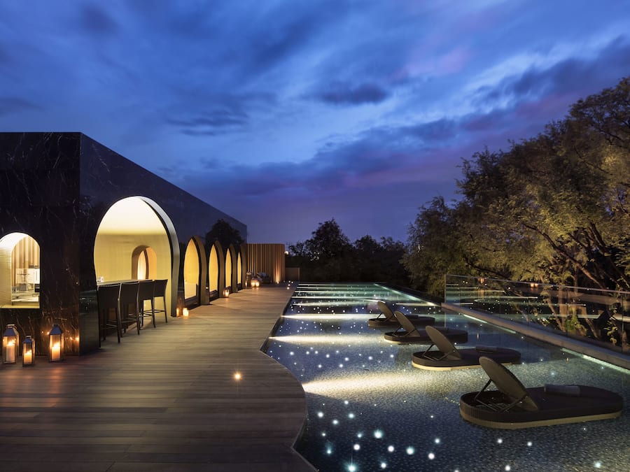 Outdoor pool, open 7 AM to 8 PM, free pool cabanas, pool umbrellas