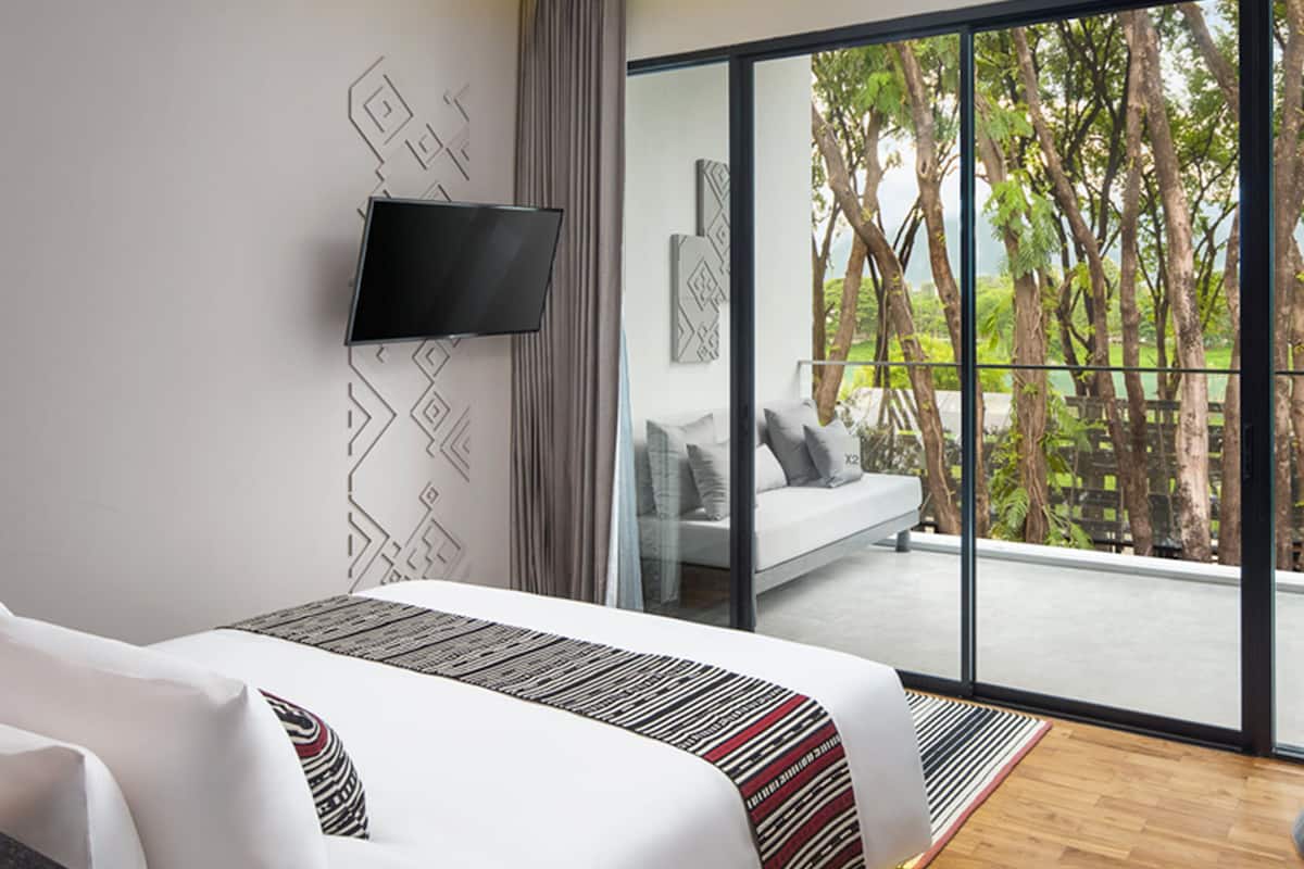 suite, garden view | minibar, in-room safe, desk, laptop workspace