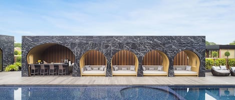 Outdoor pool, open 7 AM to 8 PM, free cabanas, pool umbrellas