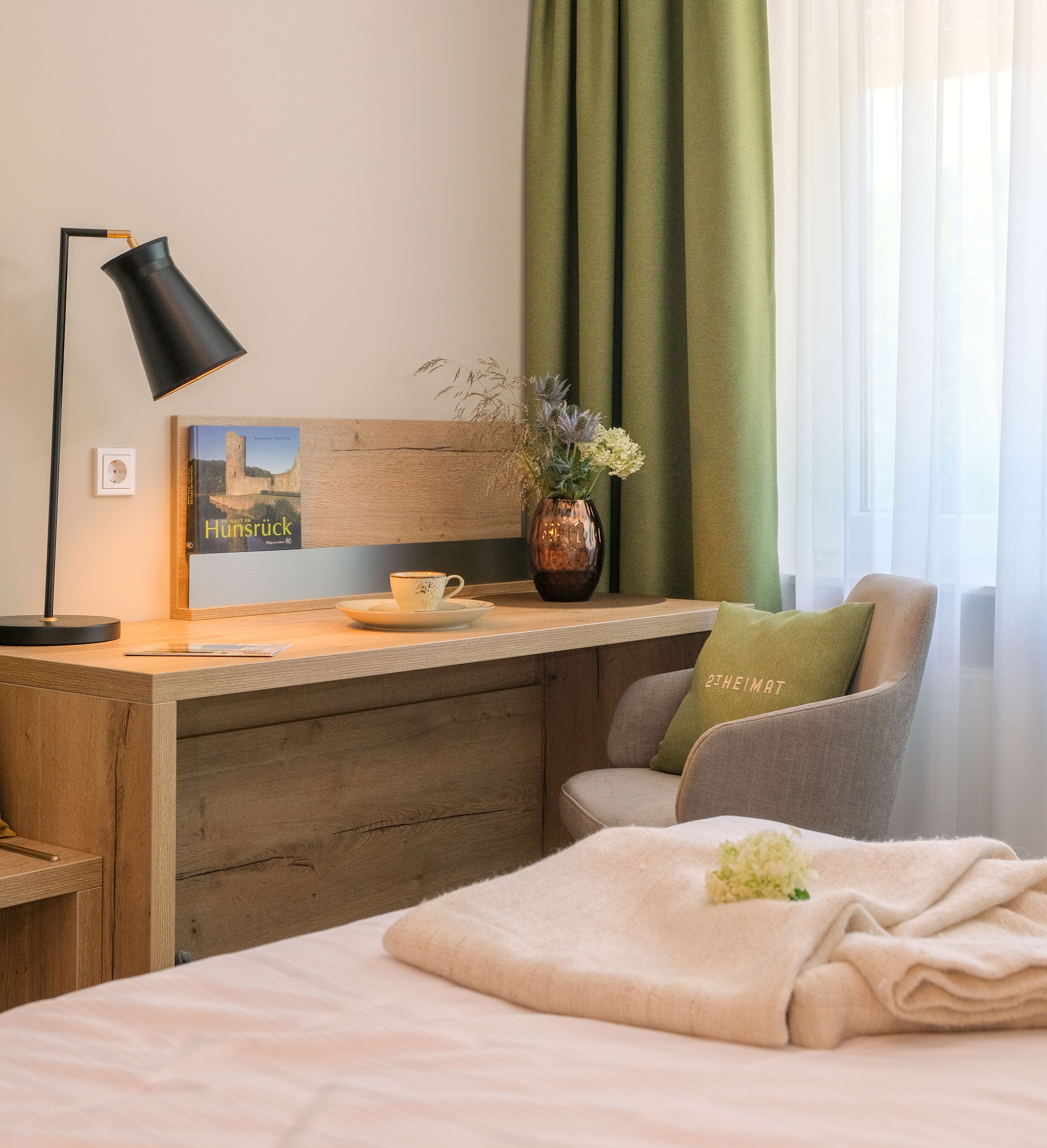 comfort single room | living area | flat-screen tv