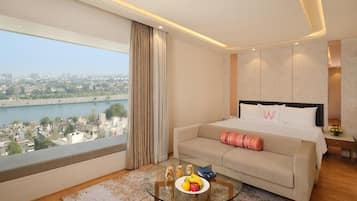 Deluxe Room, 1 King Bed (Studio Apartment) | Minibar, in-room safe, desk, laptop workspace