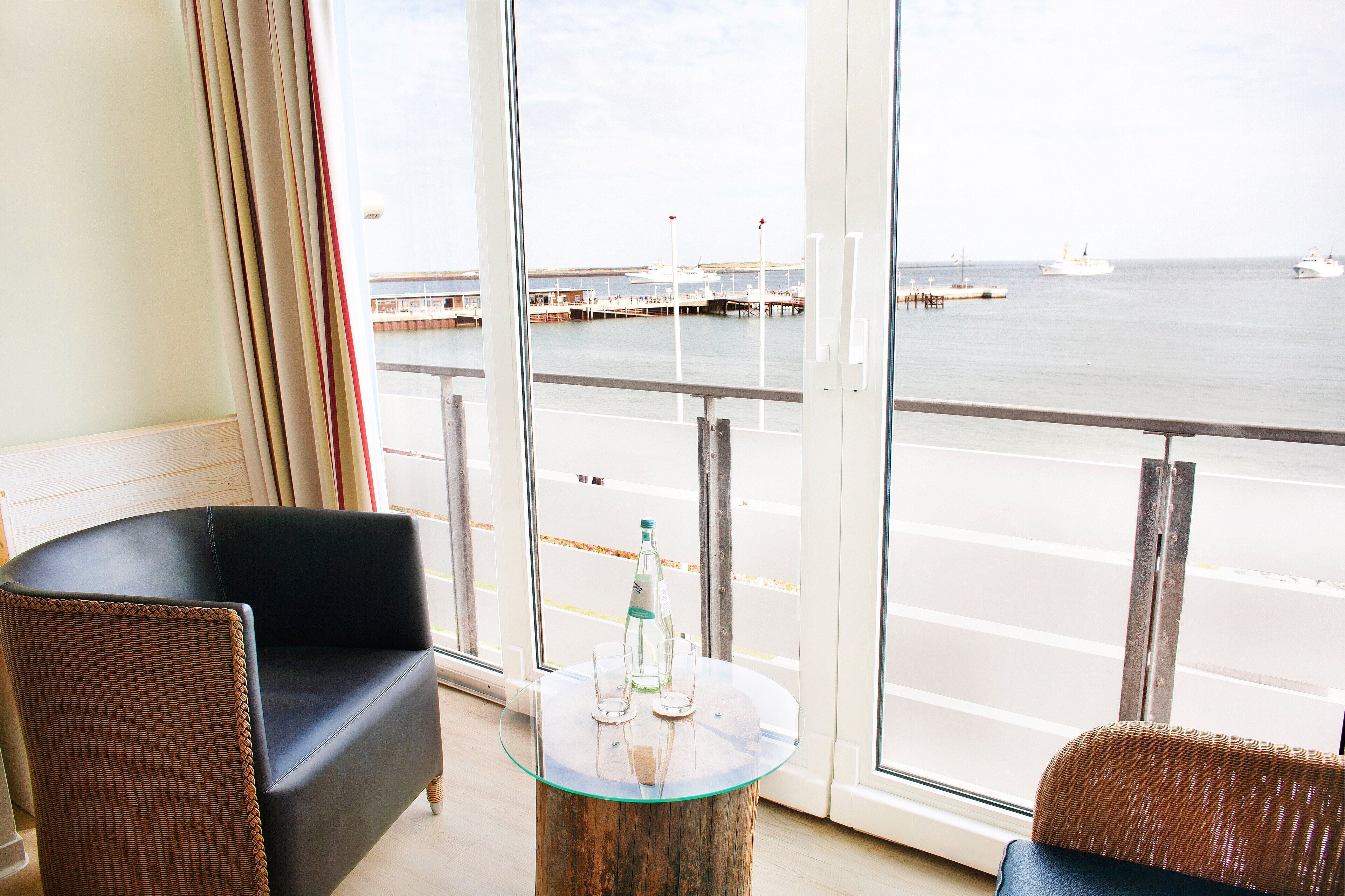 comfort double room, sea view | 1 bedroom, free minibar items, in-room safe, desk