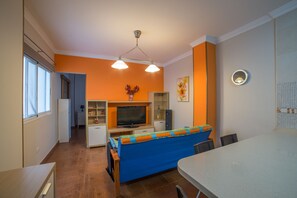 Apartamento, 1 quarto | Área de estar