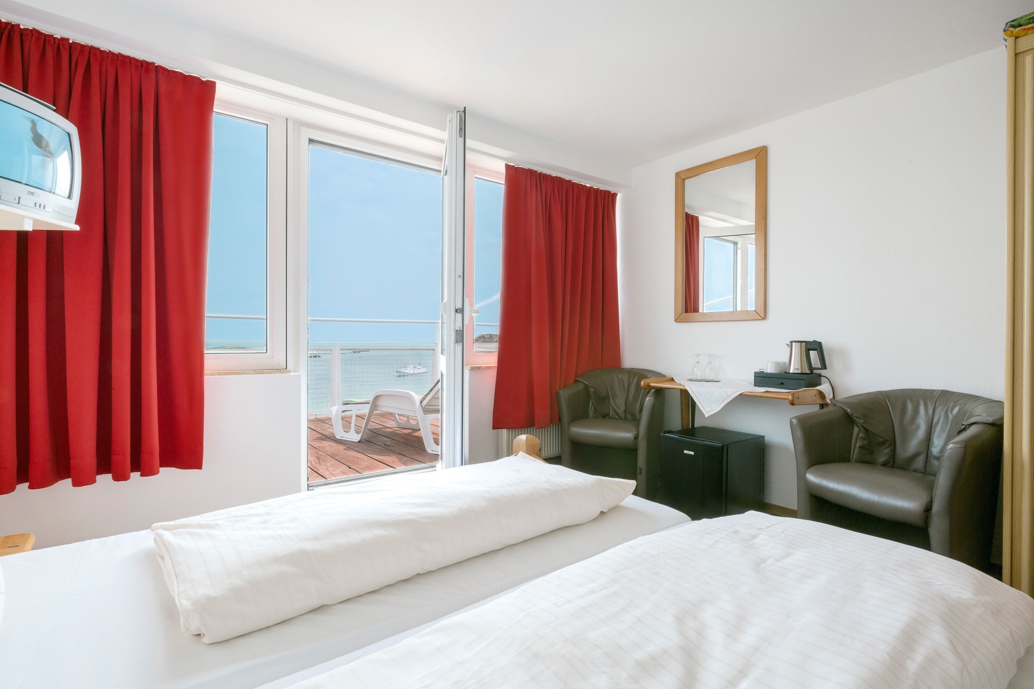 Superior Double Room, Patio, Sea View | Minibar, desk, free WiFi, bed sheets