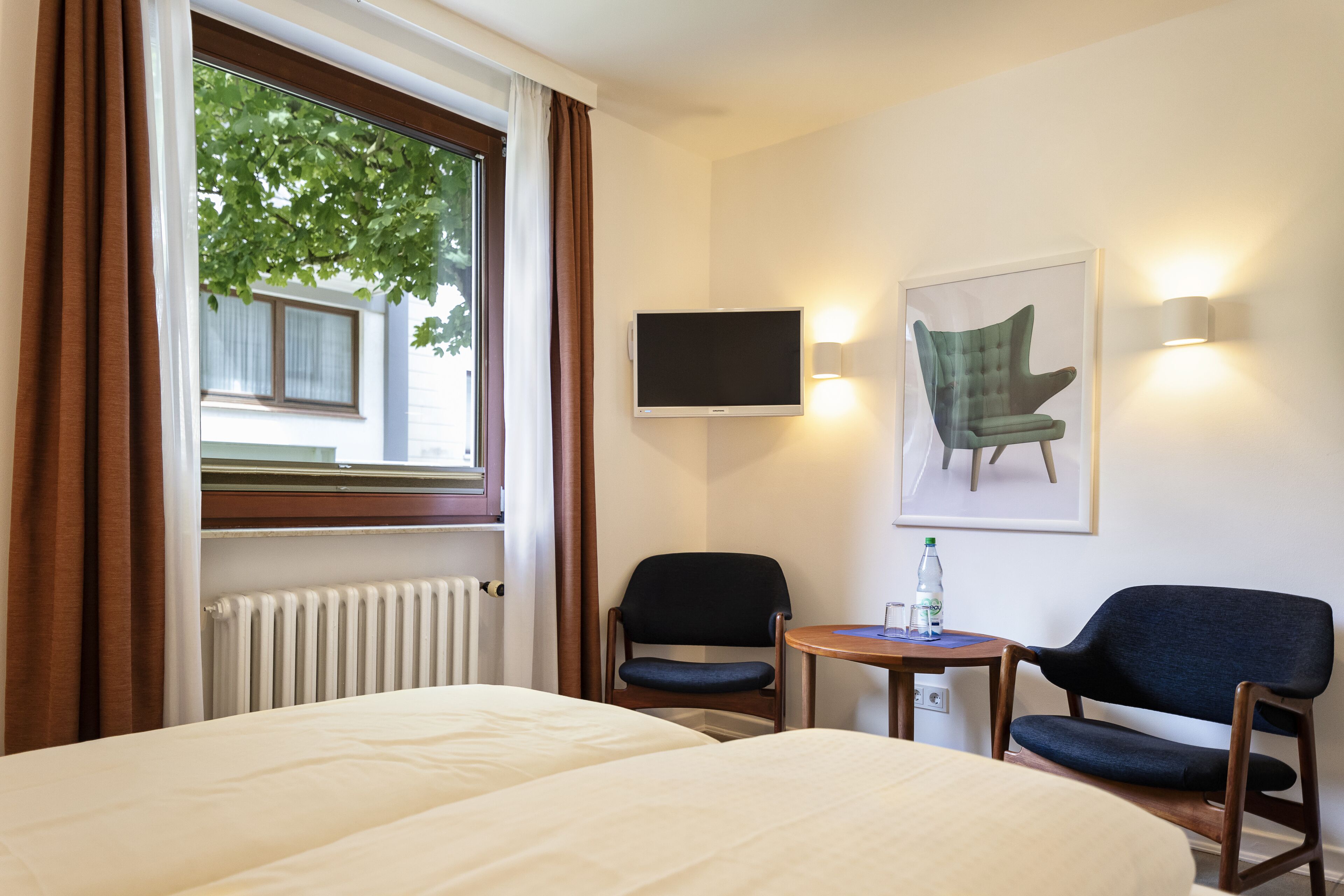 double room, garden view | living area | 45-inch flat-screen tv with satellite channels, tv