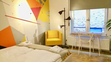 Estudio | Tabla de planchar con plancha, wifi gratis y ropa de cama