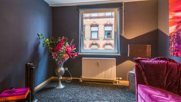 Luxury Apartment, 1 Bedroom, Kitchenette, City View | Living area | Flat-screen TV