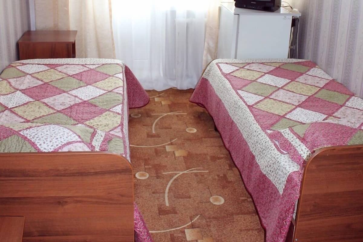 Chambre avec lits jumeaux (Small) | Fer et planche à repasser, lits bébé (en supplément), Wi-Fi gratuit