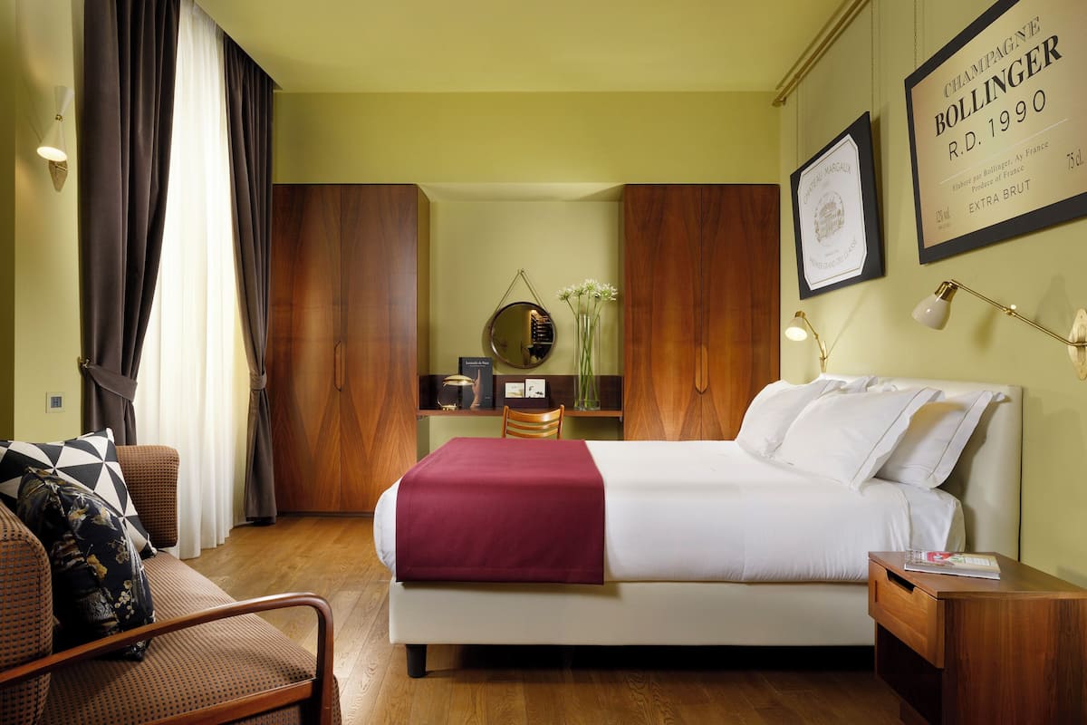 Deluxe-suite - terrasse | Premium-sengetøj, minibar, pengeskab på værelset, individuelt design