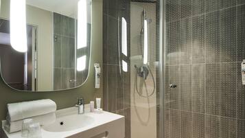 Shower, eco-friendly toiletries, hair dryer, towels