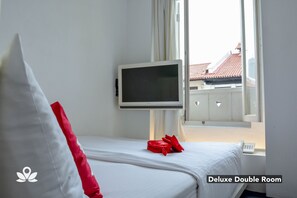 Deluxe-Doppelzimmer | Zimmersafe, Bügeleisen/Bügelbrett, kostenloses WLAN, Bettwäsche