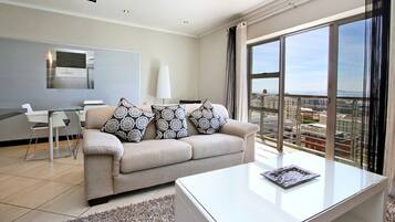 Luxury Apartment | Living room | 40-inch Smart TV with satellite channels, TV, Netflix
